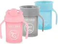 Tre Twistshake 360-muggar i rosa, grått och blått. Perfekta för små barn som lär sig dricka själva.