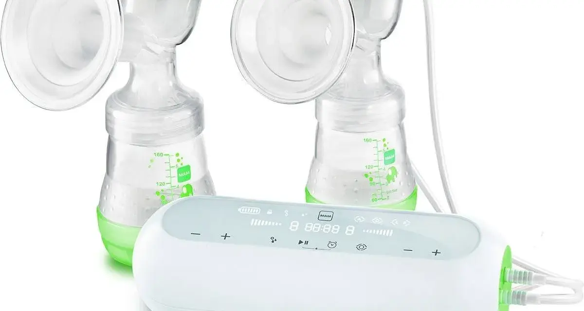 Dubbel bröstpump med Medela Freestyle-enhet. Grön och vit design.